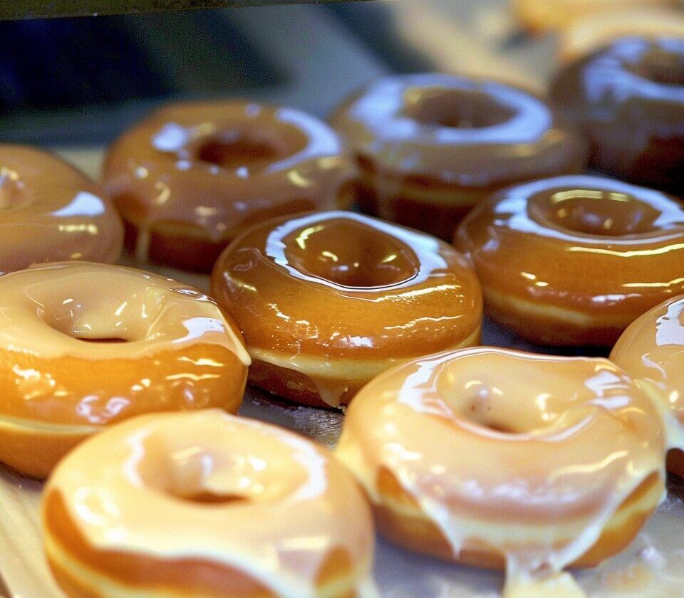 Krispy Kreme is giving free dozens to early customers on World Kindness Day